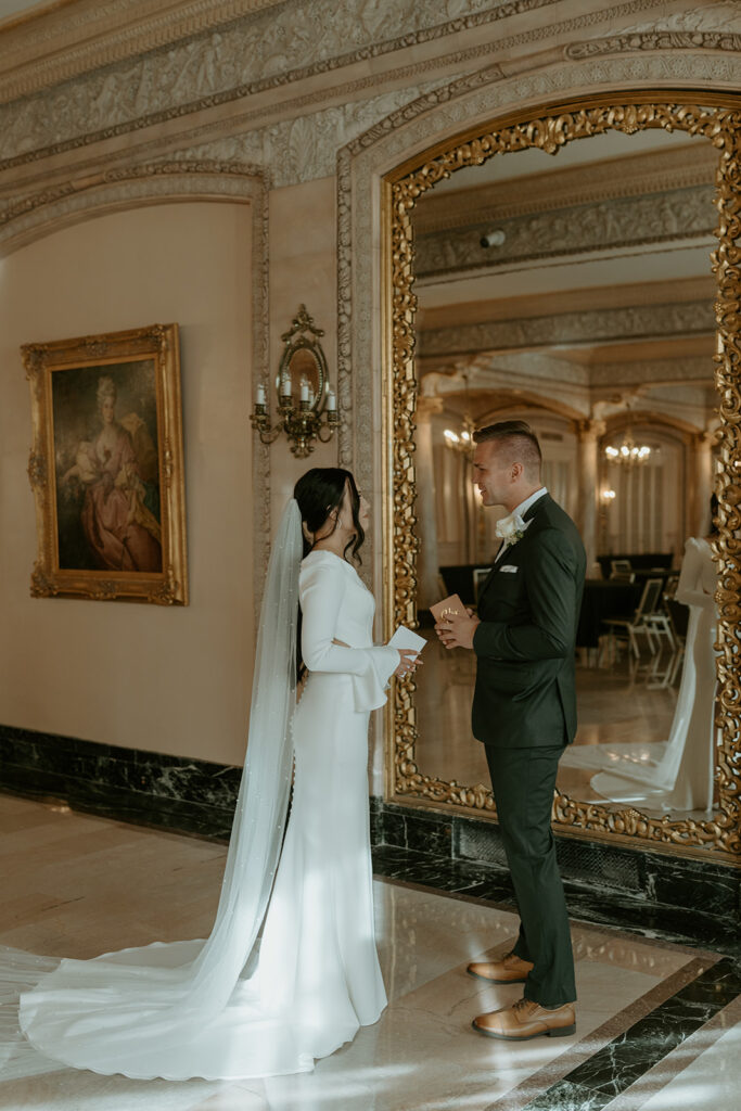 bride and groom reading private vows for courthouse elopement ceremony