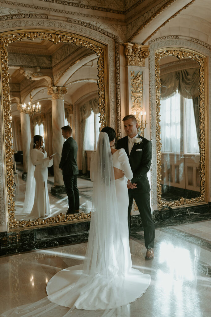 bride and groom reading private vows for courthouse elopement ceremony