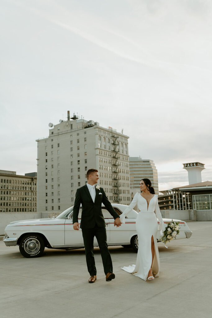 bride and groom on hotel rooftop in Spokane, WA