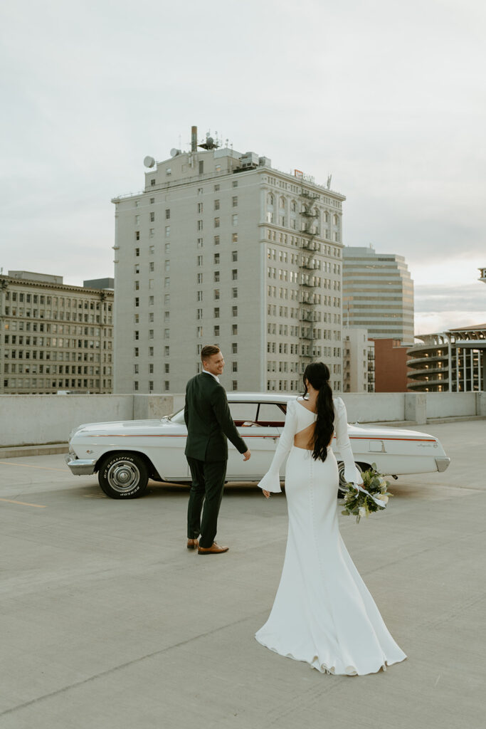 bride and groom on hotel rooftop in Spokane, WA