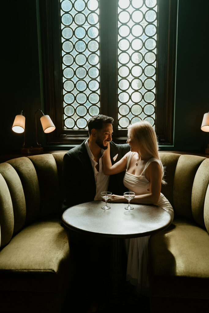 creative couples photoshoot in a bar