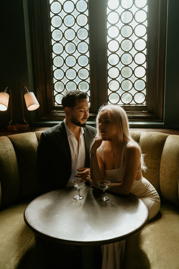 creative couples photoshoot in a bar