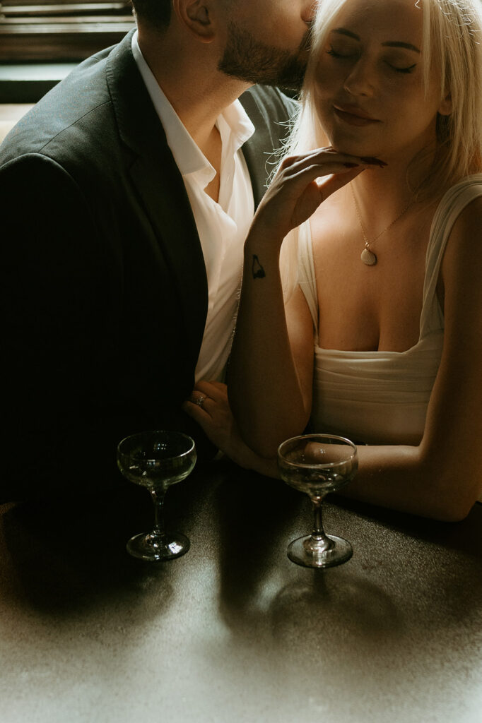 creative couples photoshoot in a bar