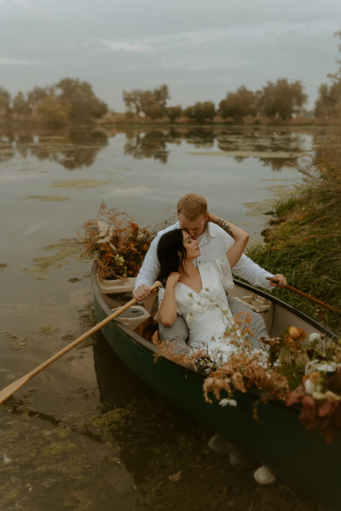 creative couples photoshoot with a canoe