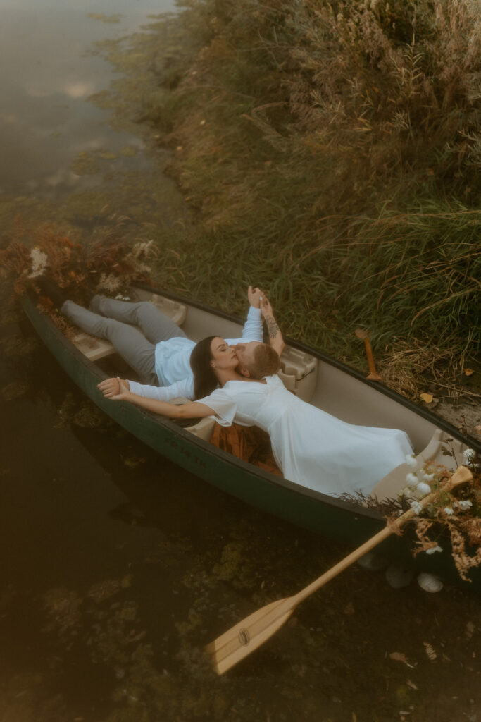 creative couples photoshoot with a canoe