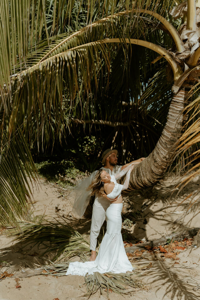 Newlyweds enjoying the serene atmosphere of their elopement in Kauai.