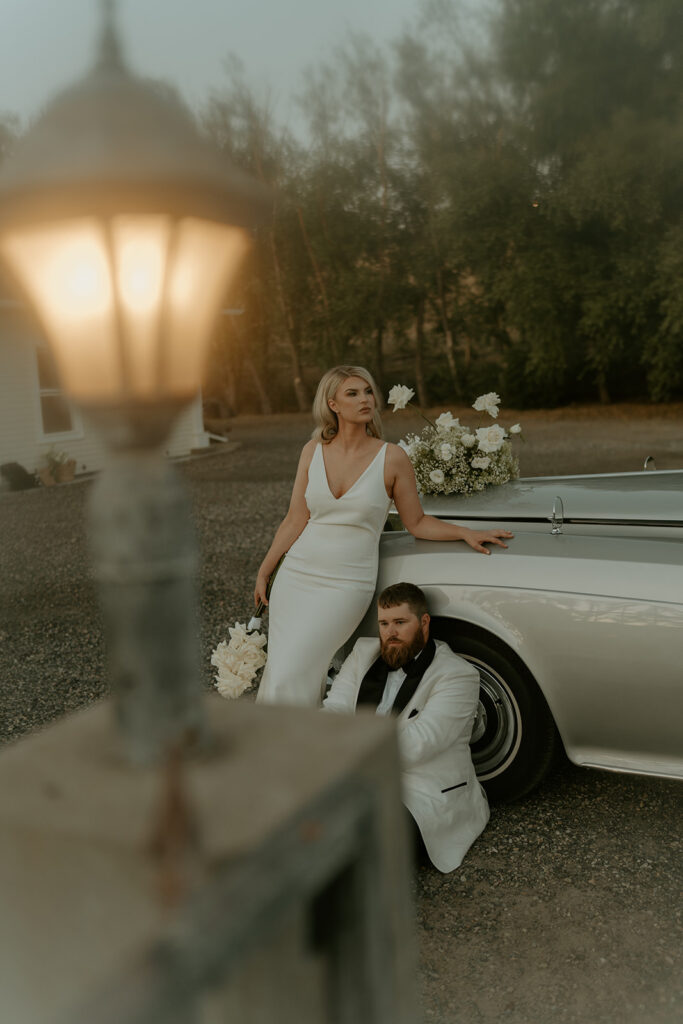 documentary style bride and groom in a vintage car