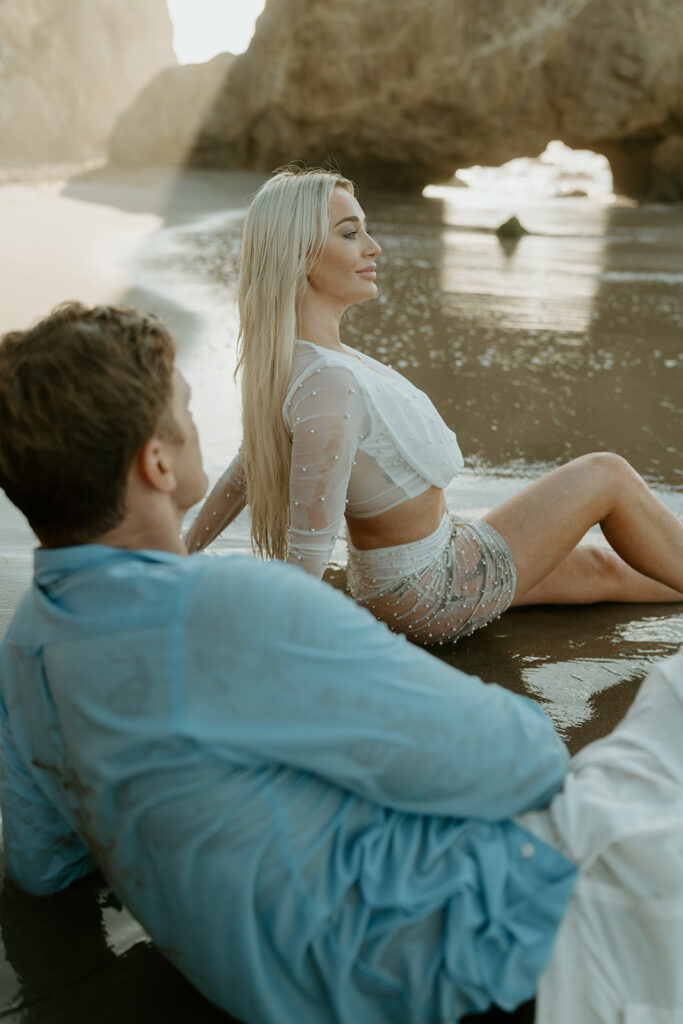 Playful Malibu engagement photos at sunrise