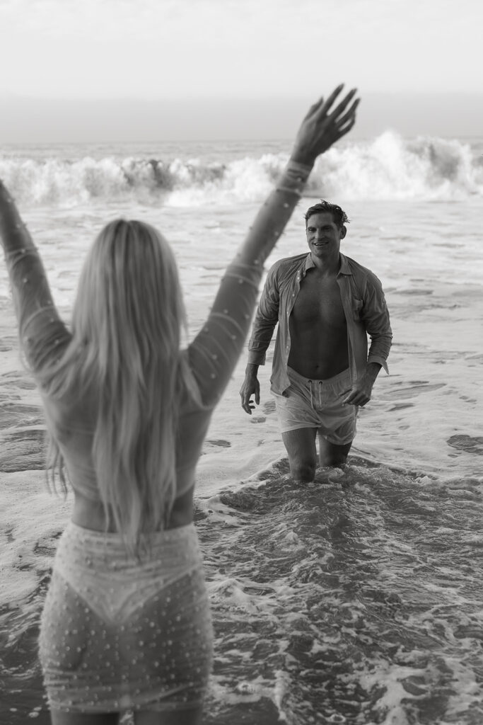 Playful Malibu engagement photos at sunrise