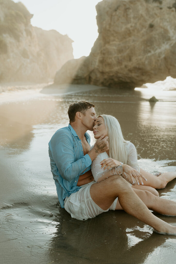 Playful Malibu engagement photos at sunrise